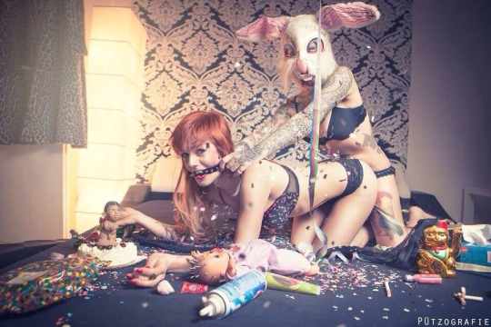 Sexy girls in bunny costume pillow fight